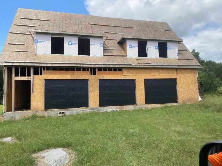 An image showing a repaired garage door in Middle TN.