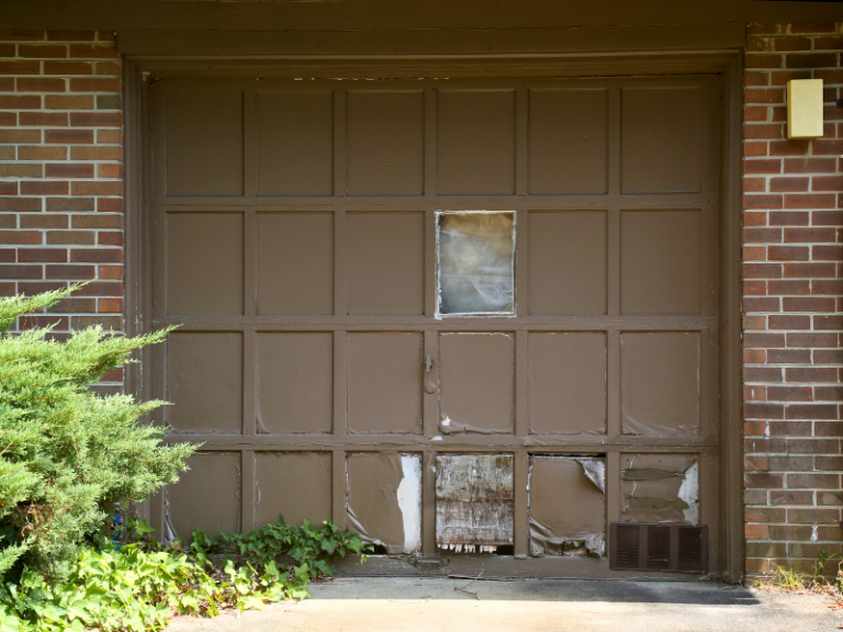 Image showing a homeowner after garage door issues are solved in Beechgrove, TN.